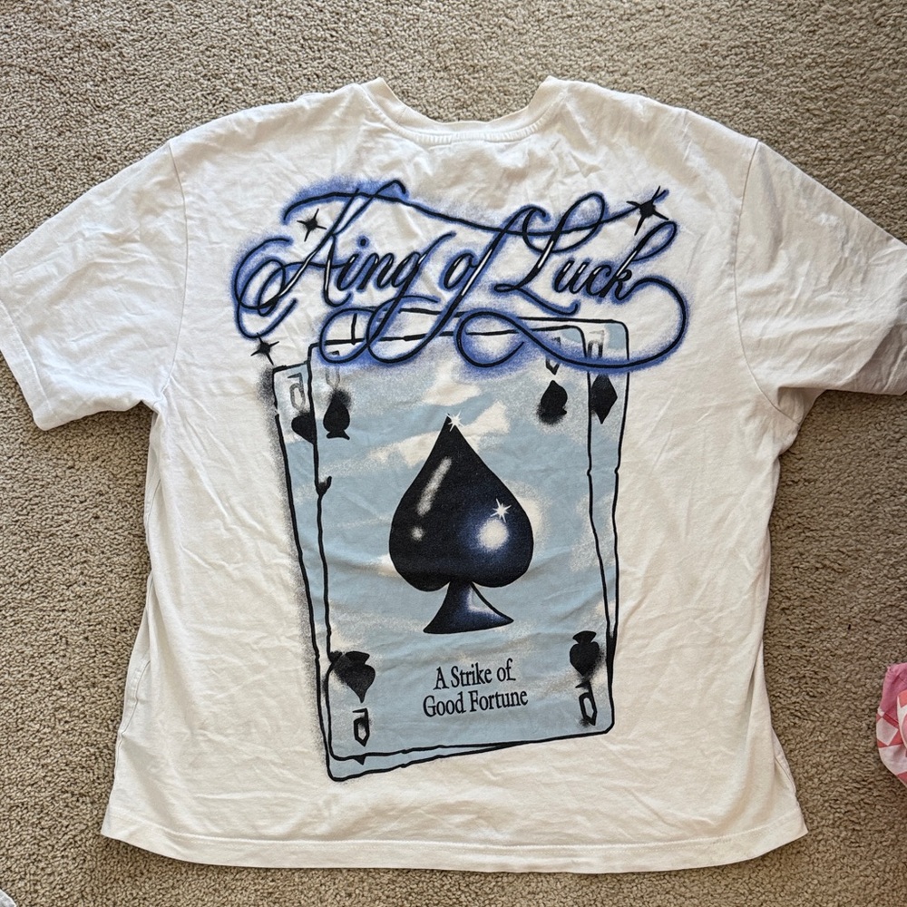 Bershka White Tee with Blue and Black King of Luck Design